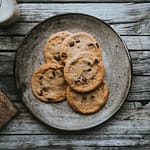 chocolate chip cookies on wooden table